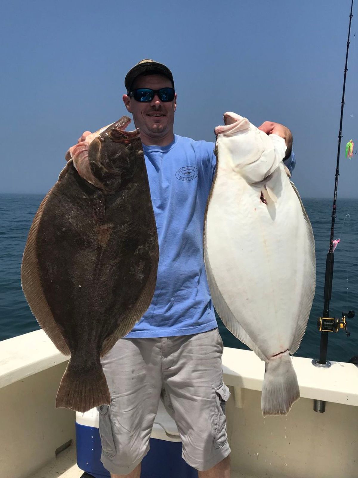 a person holding a fish