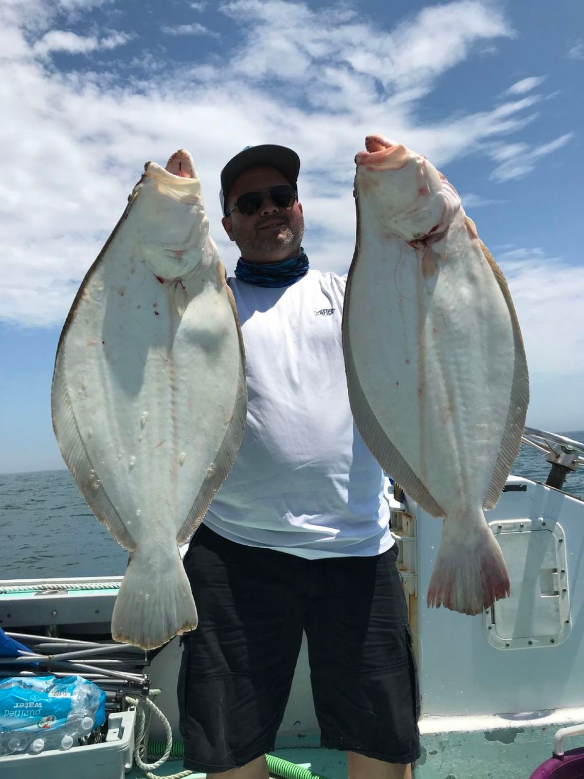 a person holding a fish