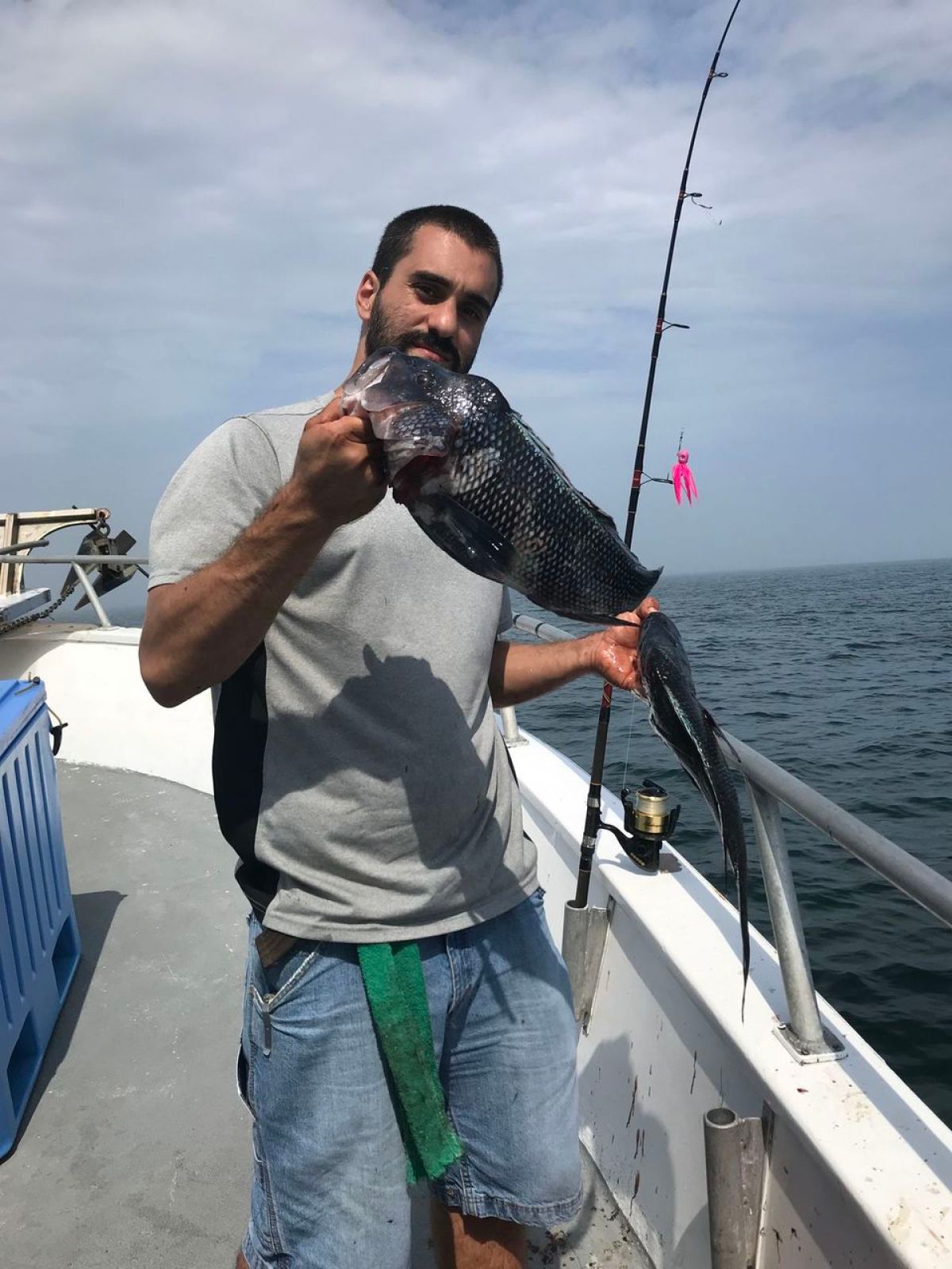 a man standing on a boat in the water