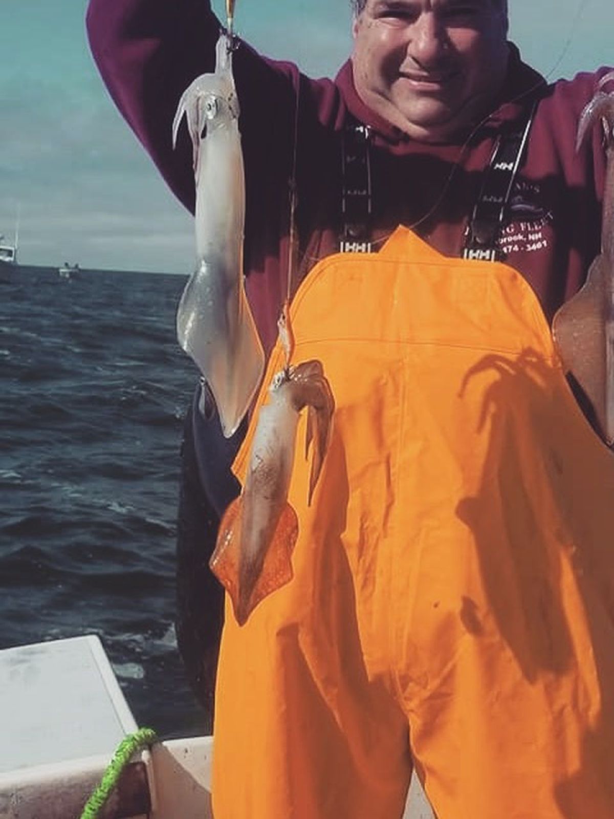 a person holding a fish