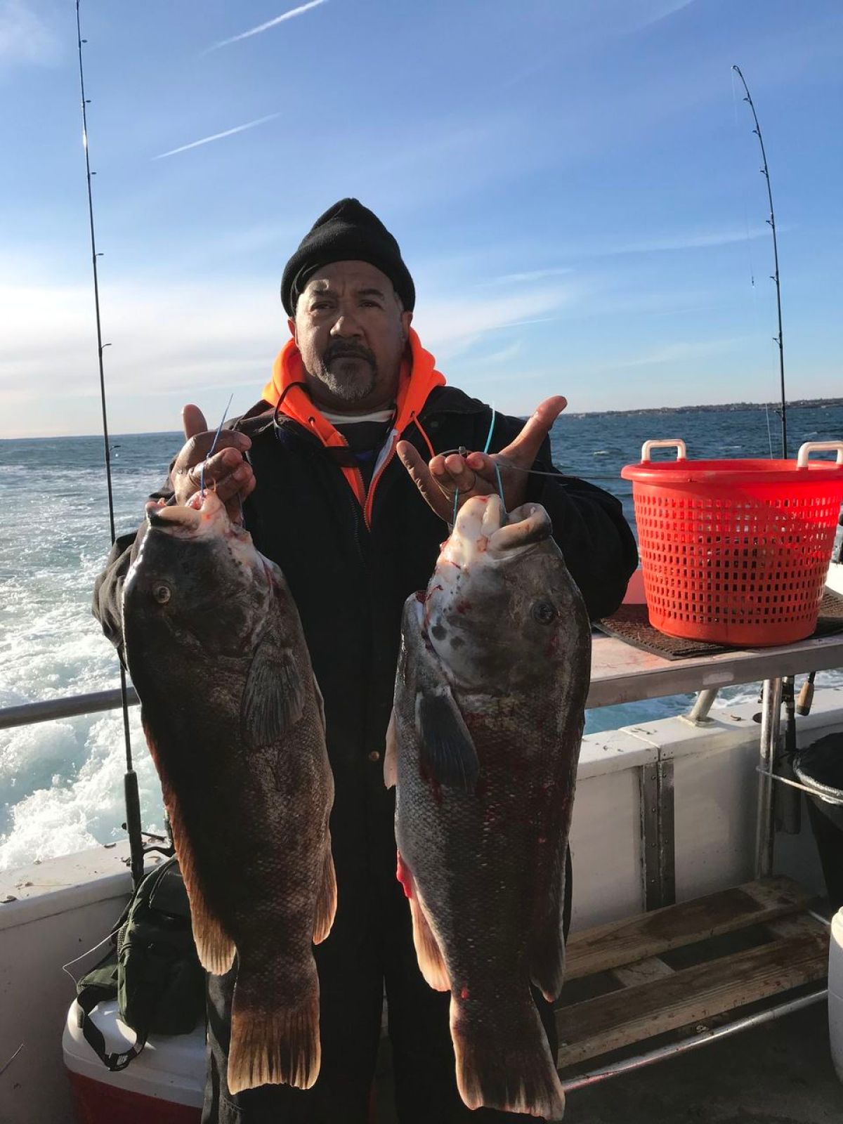 a person holding a fish